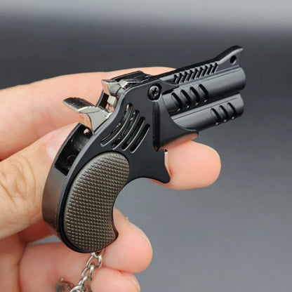1Pcs Mini Keychain Metal Rubber Band Gun Game Toy Gun Launcher Adult Simulation Pistol Toys Gifts Pendent