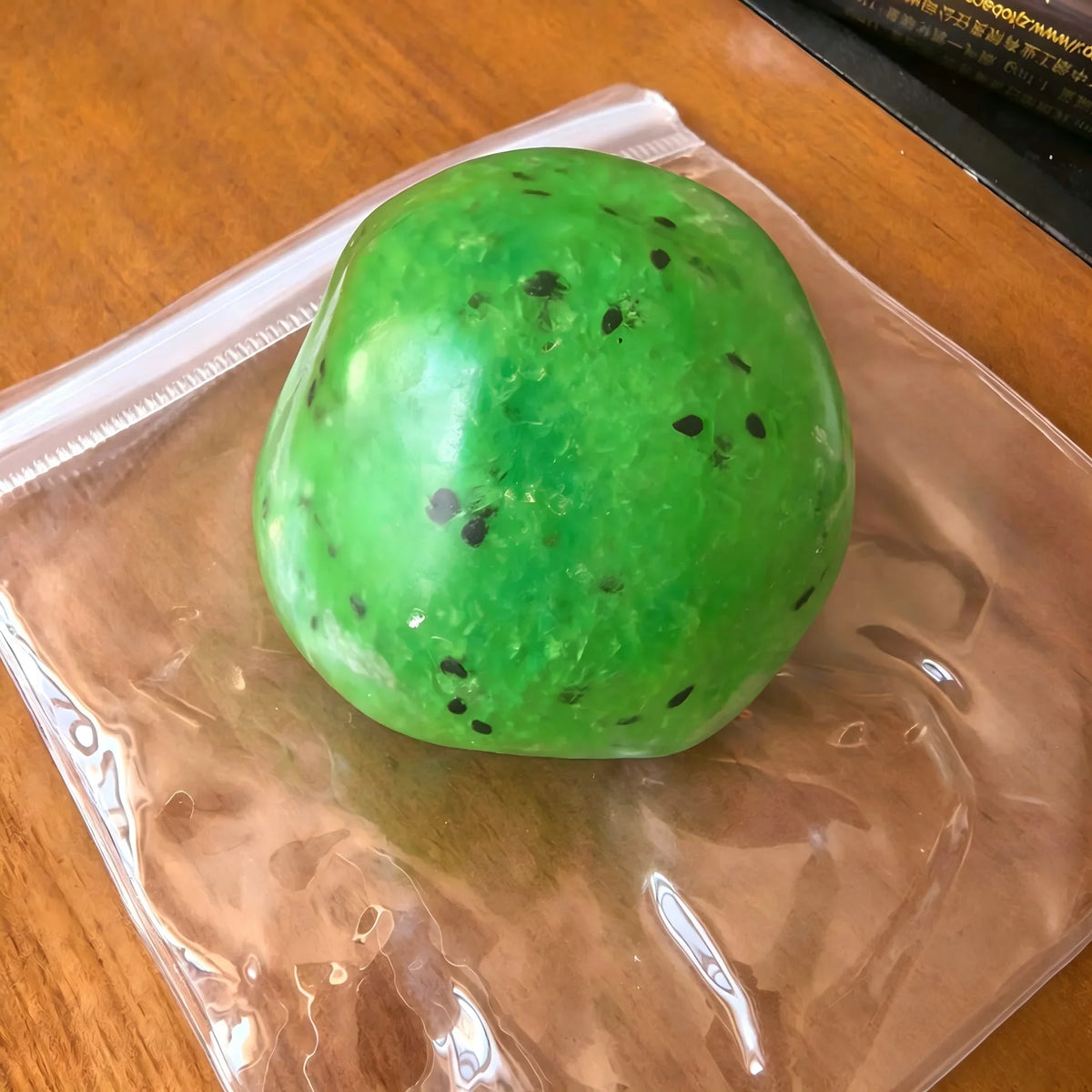 Passion Fruit Vaseline Filling Squeeze Ball, Yellow TPR Squishy Fidget Toy with Black Seeds, Crinkling Sound Ice‑Slush Texture
