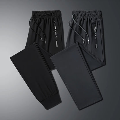 New Summer Korean Ice Silk Elastic Trousers Cool Thin Casual Men'S Loose Long Large Size Small Foot Sports Pants 8XL