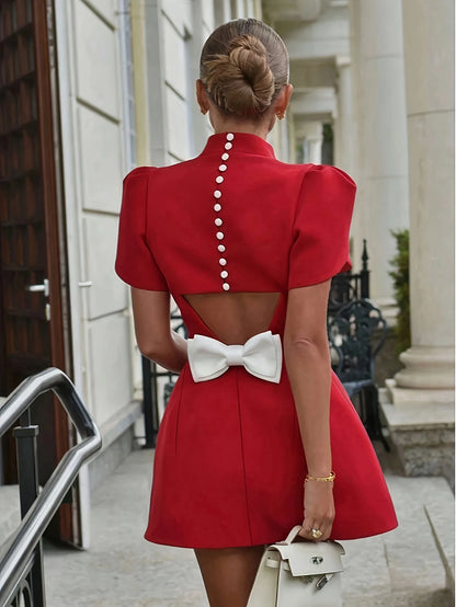 Leisure and elegant style with hollowed out bow design at the back, round neck button up women's dress, mid length skirt