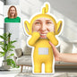 Customizable plush cartoon doll pillow with personal photo facial design, happy yellow characters, expressive eyes and smiling