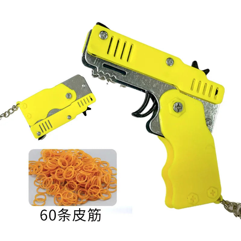 Wholesale Mini Rubber Bands Shoot Gun Alloy Material Multi Function 6 Colors Key Chain Collapsible Funny Mini Gun Toys For Kids