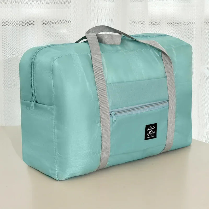Large-capacity luggage storage bag, foldable portable travel bag, moving clothes packing bag with pull handle