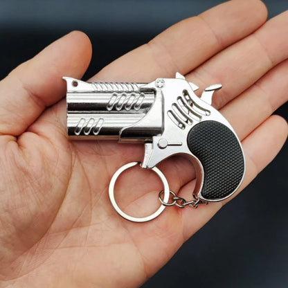 1Pcs Mini Keychain Metal Rubber Band Gun Game Toy Gun Launcher Adult Simulation Pistol Toys Gifts Pendent