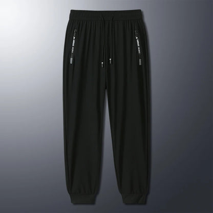 New Summer Korean Ice Silk Elastic Trousers Cool Thin Casual Men'S Loose Long Large Size Small Foot Sports Pants 8XL