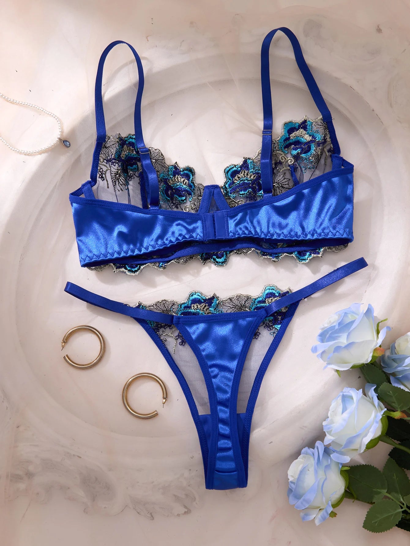 A Set of Sexy Blue Lingerie, Featuring Floral Patterns, Combining Charm and Sexiness ZA825146