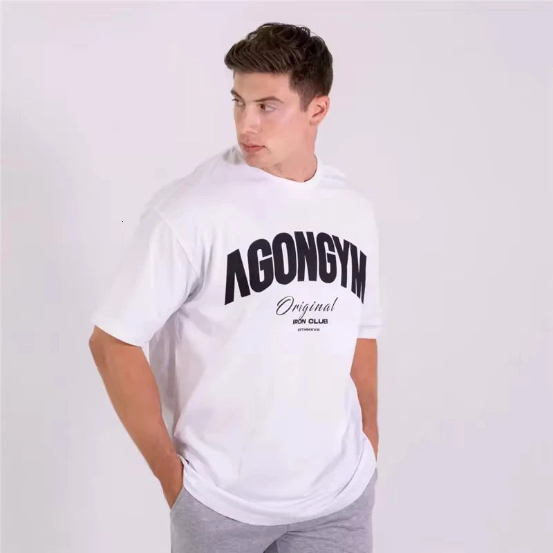 Men's White Oversized Gym T-Shirt, Agongym Bold Letter Graphic Print, Casual Workout Streetwear Tee for Lifting