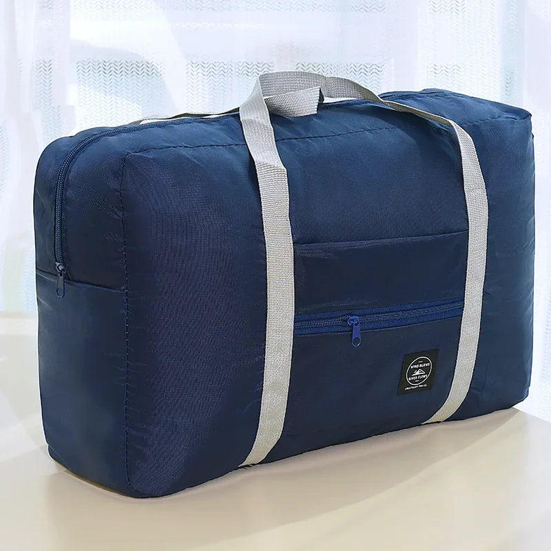 Large-capacity luggage storage bag, foldable portable travel bag, moving clothes packing bag with pull handle
