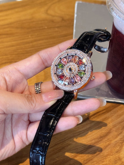 A dazzling and stylish luxury women's watch, quartz watch set with colored rhinestones and featuring a captivating rotating dial