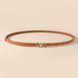 A small waist belt with a butterfly buckle, suitable for dresses, shirts and jeans. It's a new summer style that cinches the wai