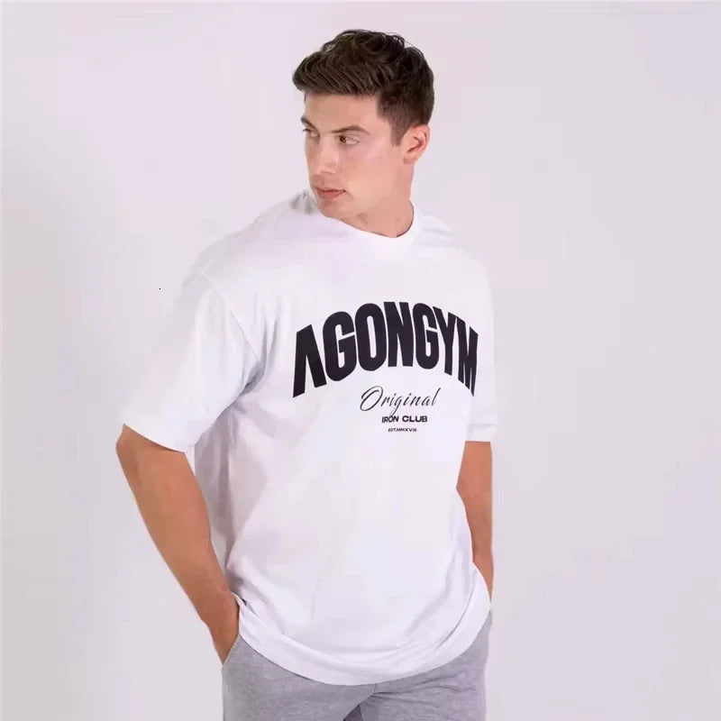 Men's White Oversized Gym T-Shirt, Agongym Bold Letter Graphic Print, Casual Workout Streetwear Tee for Lifting