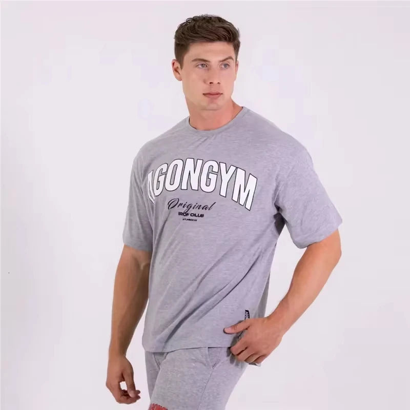 Men's White Oversized Gym T-Shirt, Agongym Bold Letter Graphic Print, Casual Workout Streetwear Tee for Lifting
